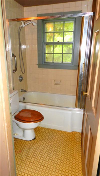 68 Cedar Land Road Orleans, MA 02653 - Photo 13 of 20 a bathroom with a tub a sink and a shower