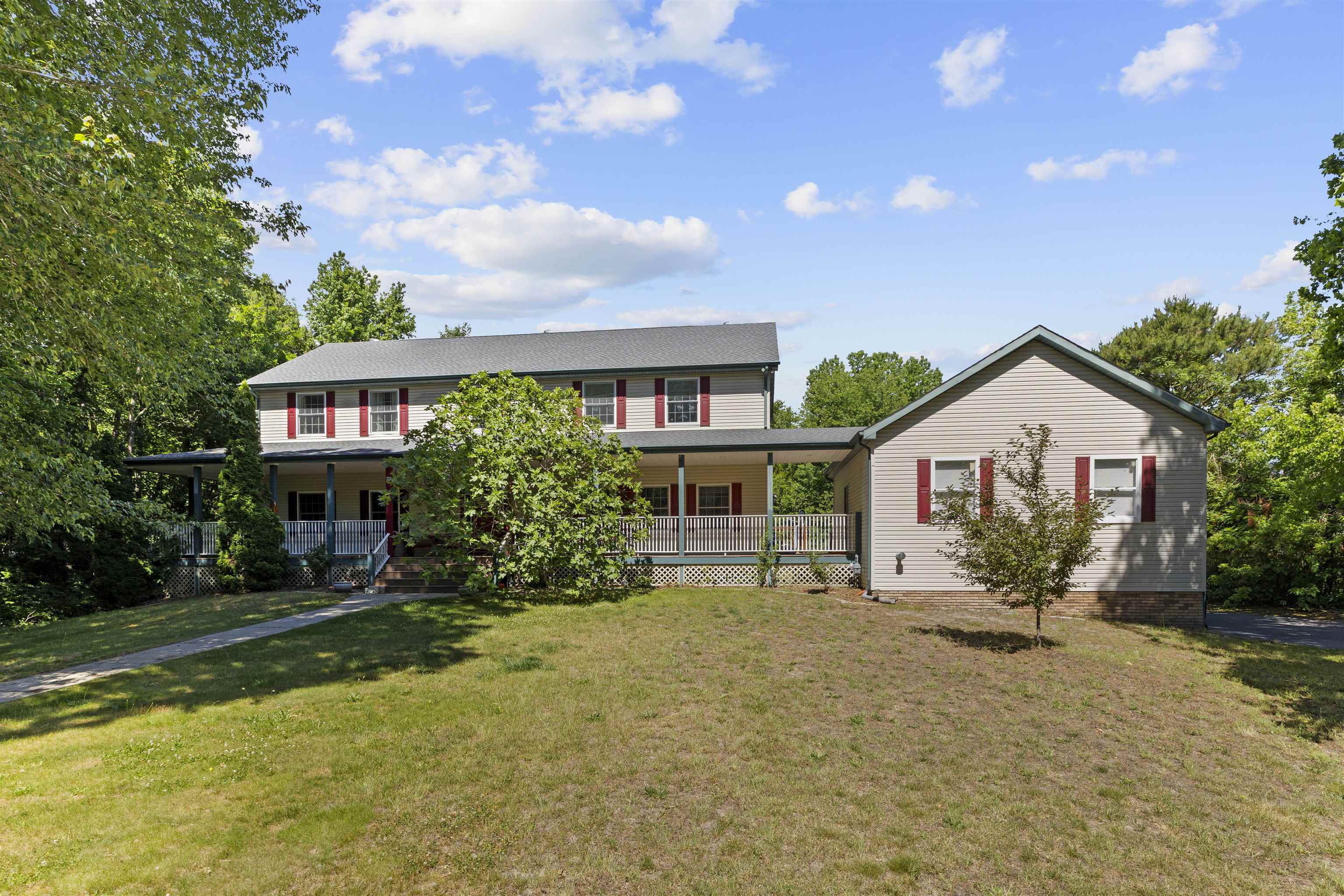 551 Shunpike Road Cape May Court House, NJ 08210 - Photo 2 of 47 a house view with a garden space