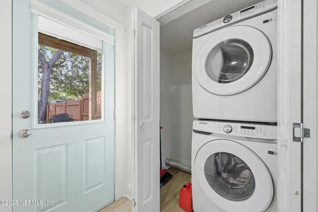 a utility room with dryer and washer