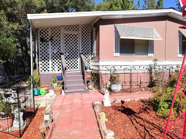 a view of a house with a patio