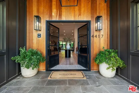 a view of a entryway door front of house
