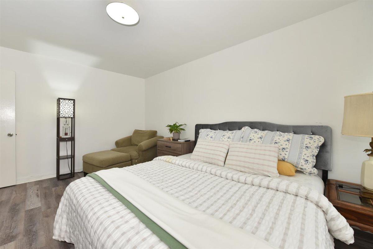 196-65 69th Avenue, Unit 1 Queens, NY 11365 - Photo 17 of 24 Bedroom with wood finished floors