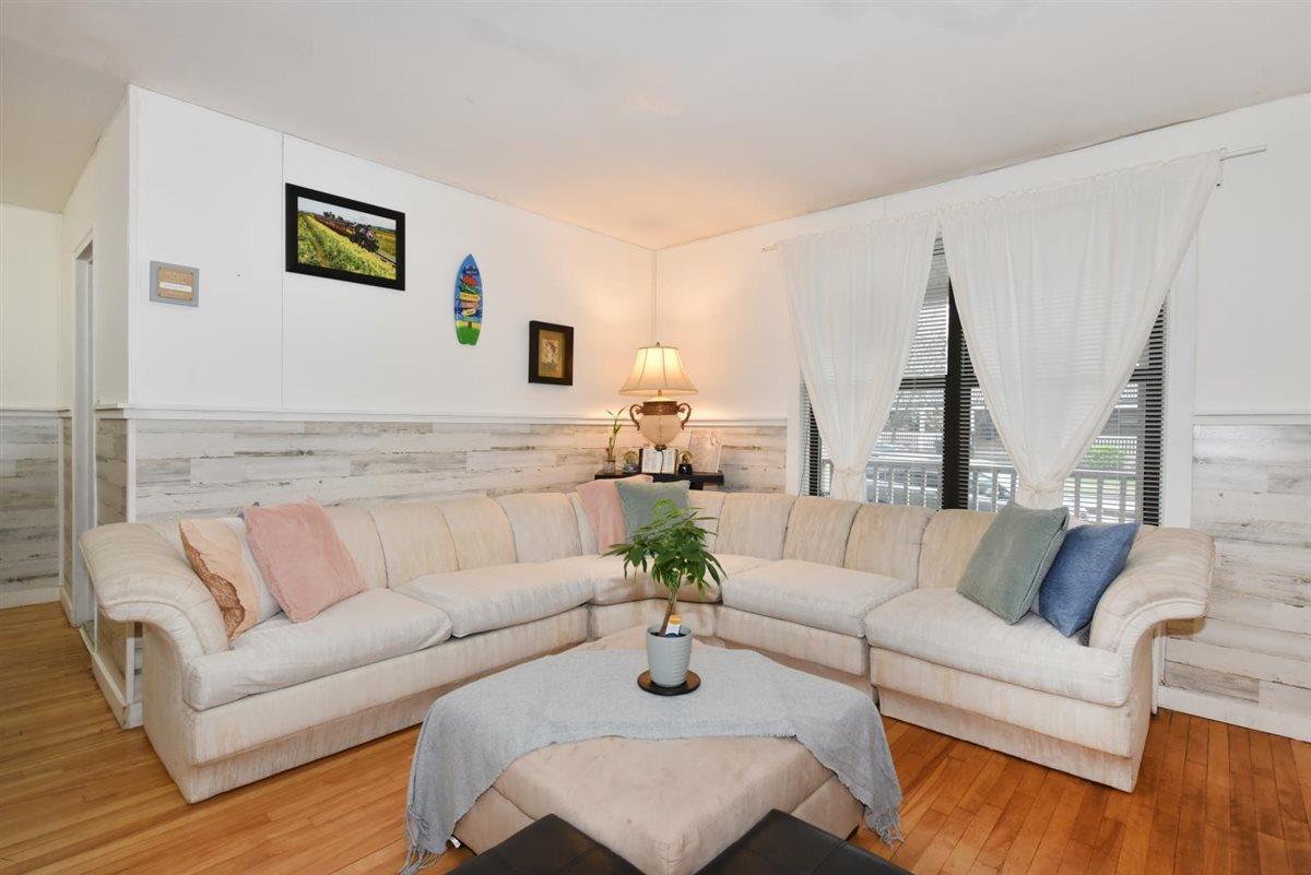 196-65 69th Avenue, Unit 1 Queens, NY 11365 - Photo 5 of 24 Living room with hardwood / wood-style floors