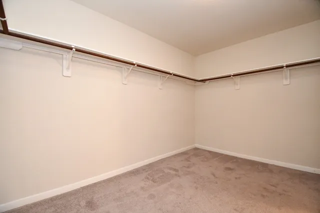 a view of a room with racks on the wall