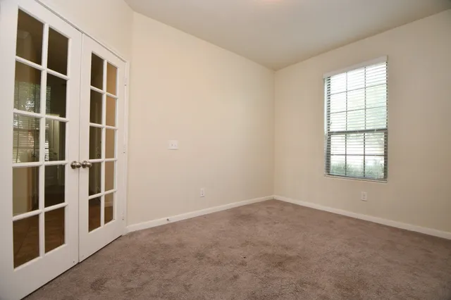 an empty room with windows