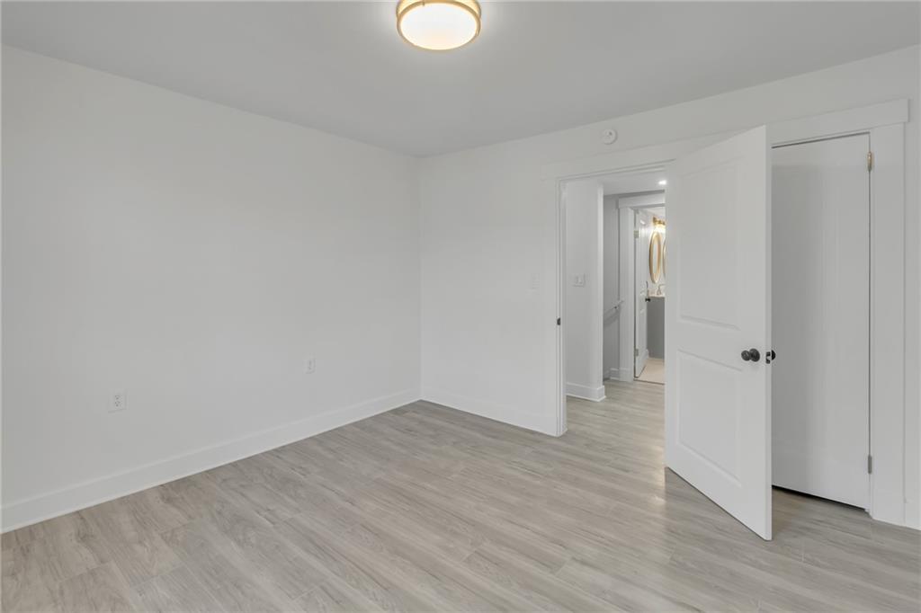517 Adams Street Rochester, PA 15074 - Photo 13 of 21 a view of a room with wooden floor