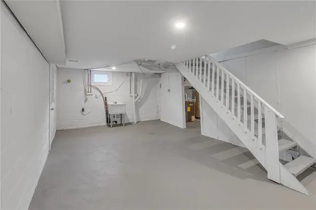 a view of a livingroom with stairs