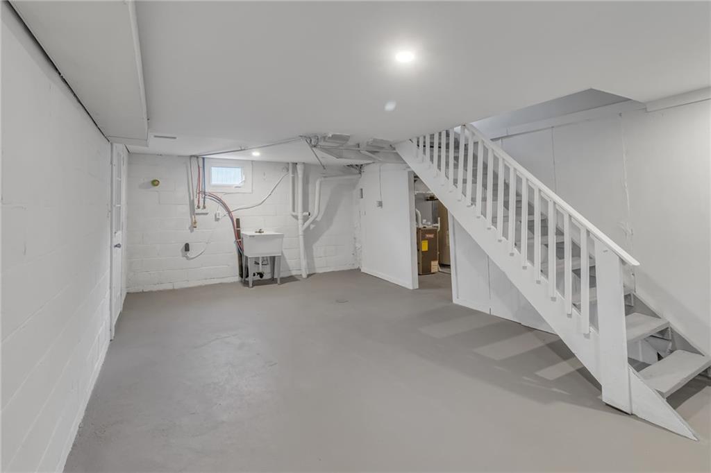 517 Adams Street Rochester, PA 15074 - Photo 17 of 21 a view of a livingroom with stairs