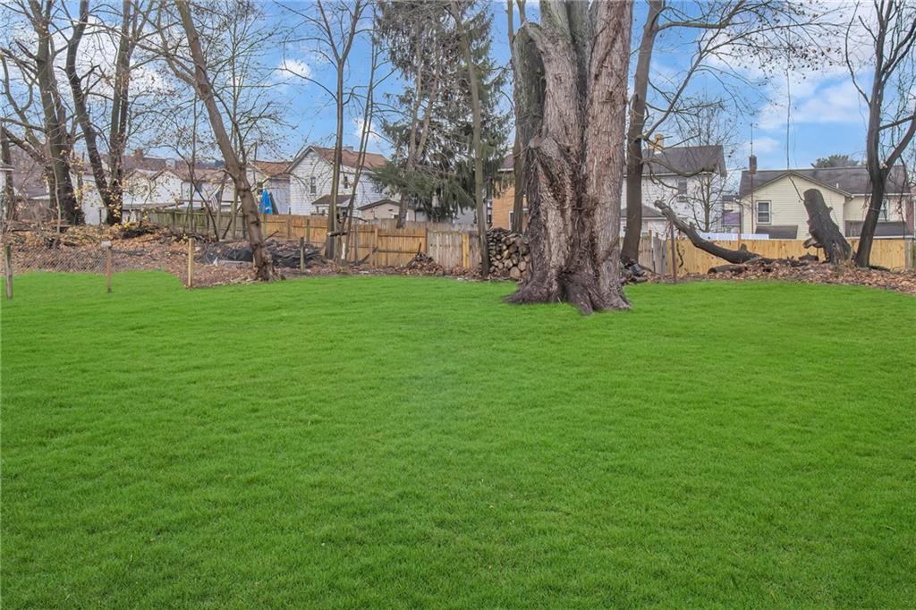 517 Adams Street Rochester, PA 15074 - Photo 5 of 21 a backyard of a house with lots of green space