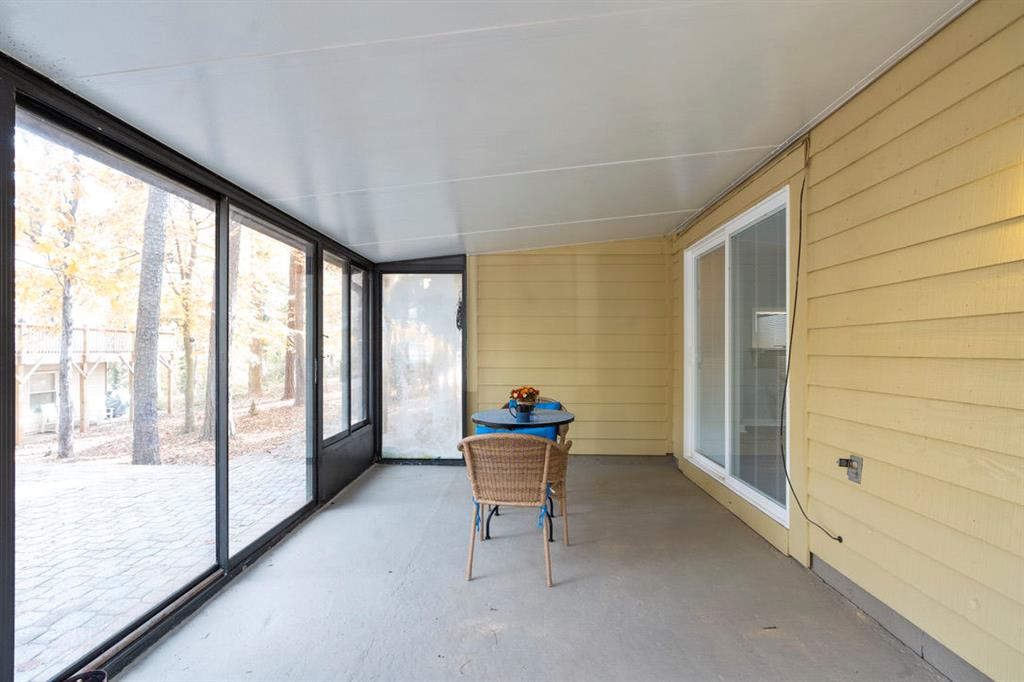 1213 Hanover Place Alpharetta, GA 30009 - Photo 15 of 25 a living room with furniture and large windows