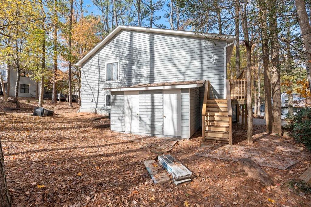 1213 Hanover Place Alpharetta, GA 30009 - Photo 24 of 25 a view of a house with a yard