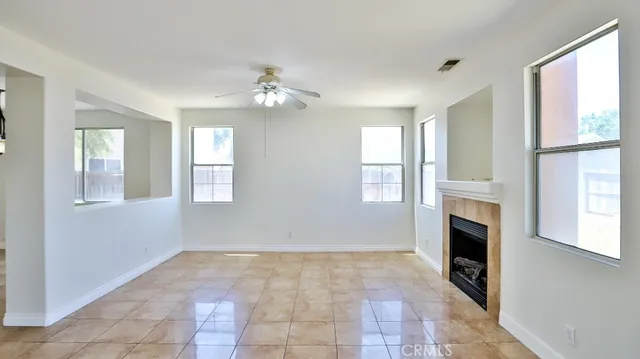 a view of livingroom with furniture window and fireplace