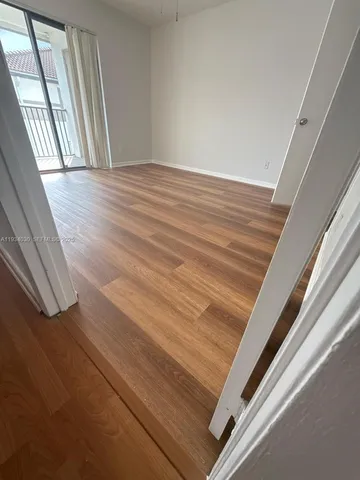 a view of wooden floor and staircase