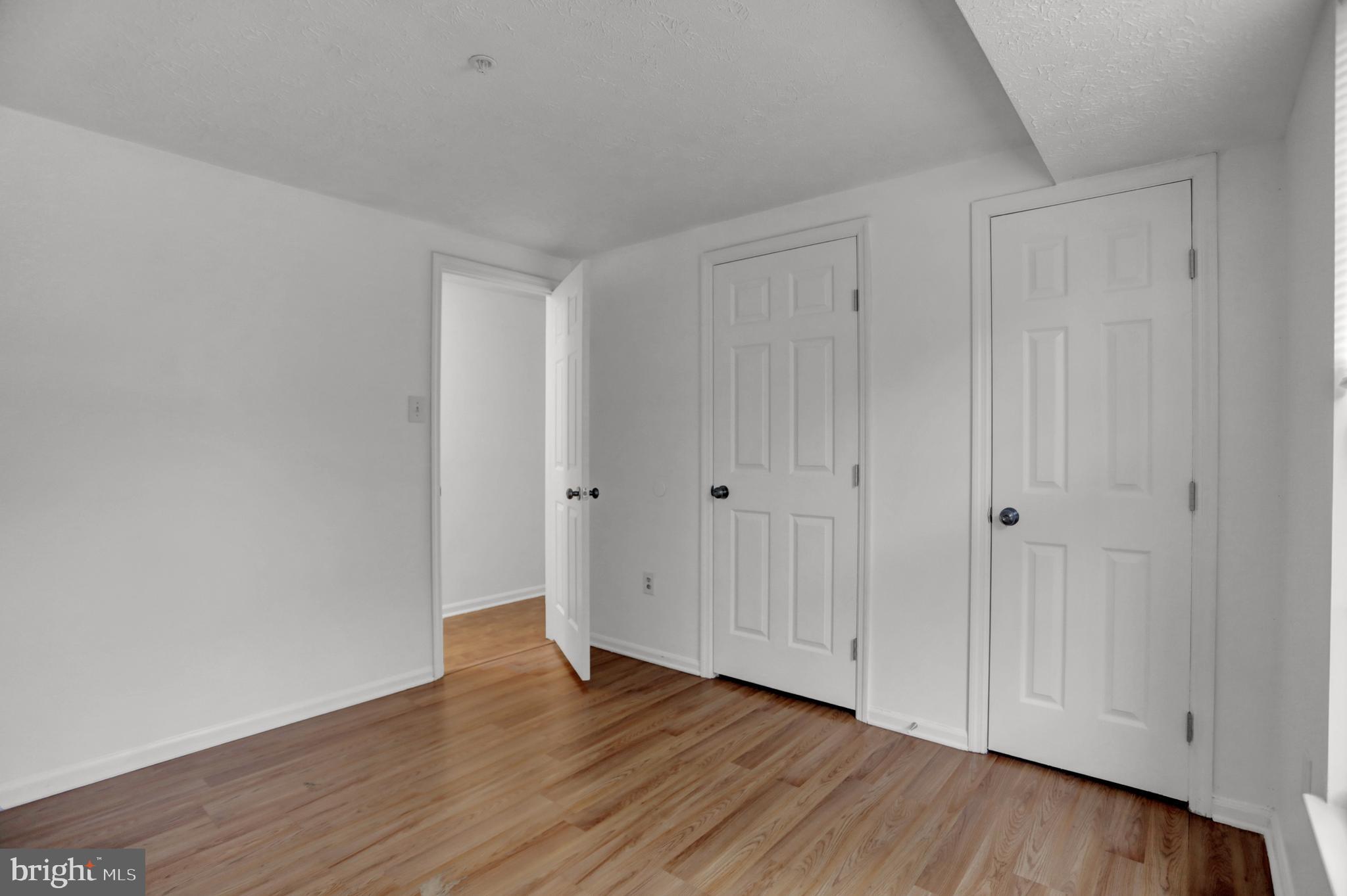 904 A Swallow Crest Court, Unit 904A Edgewood, MD 21040 - Photo 21 of 33 a view of an empty room with wooden floor
