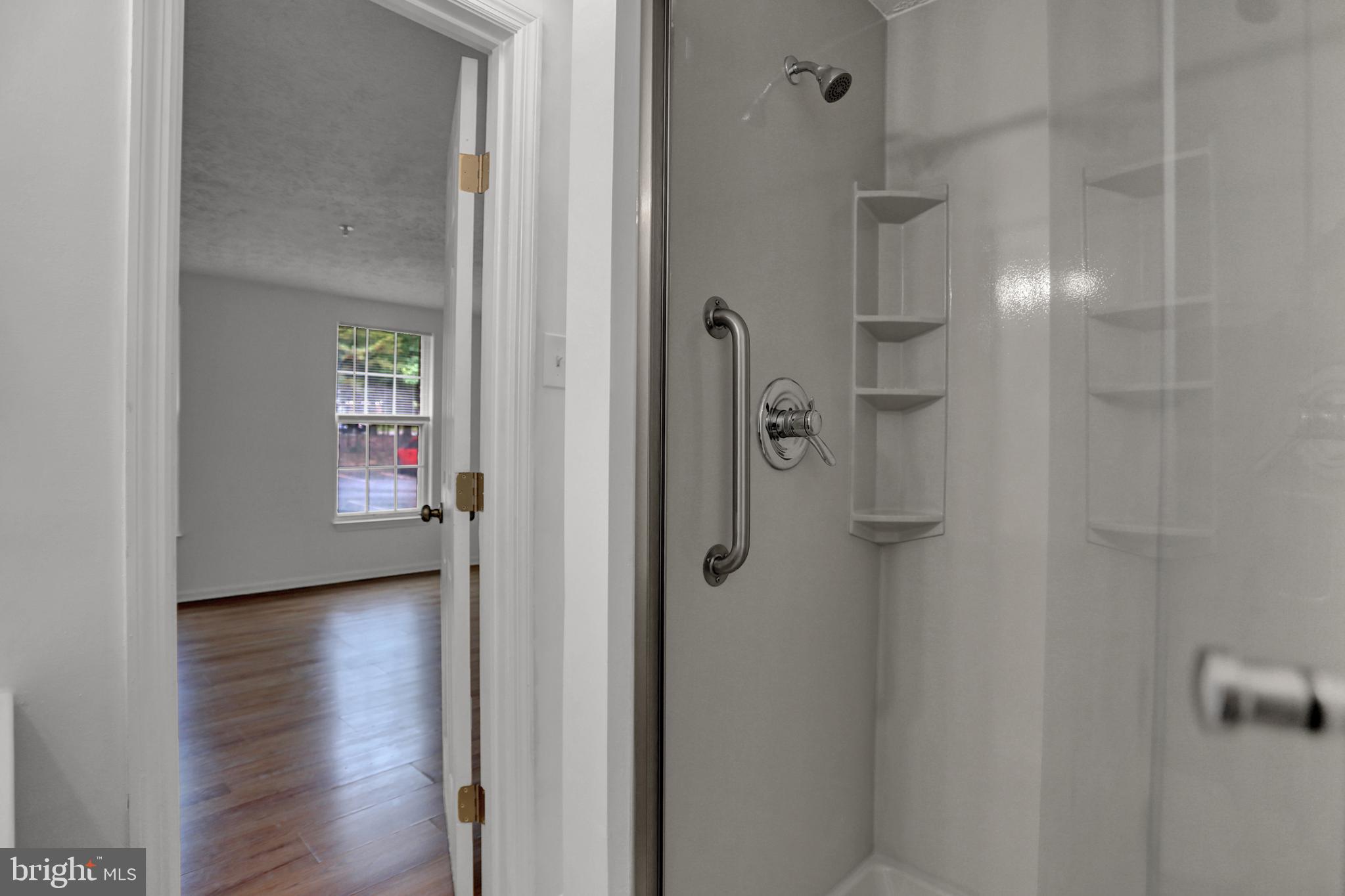 904 A Swallow Crest Court, Unit 904A Edgewood, MD 21040 - Photo 23 of 33 a view of a hallway with wooden floor