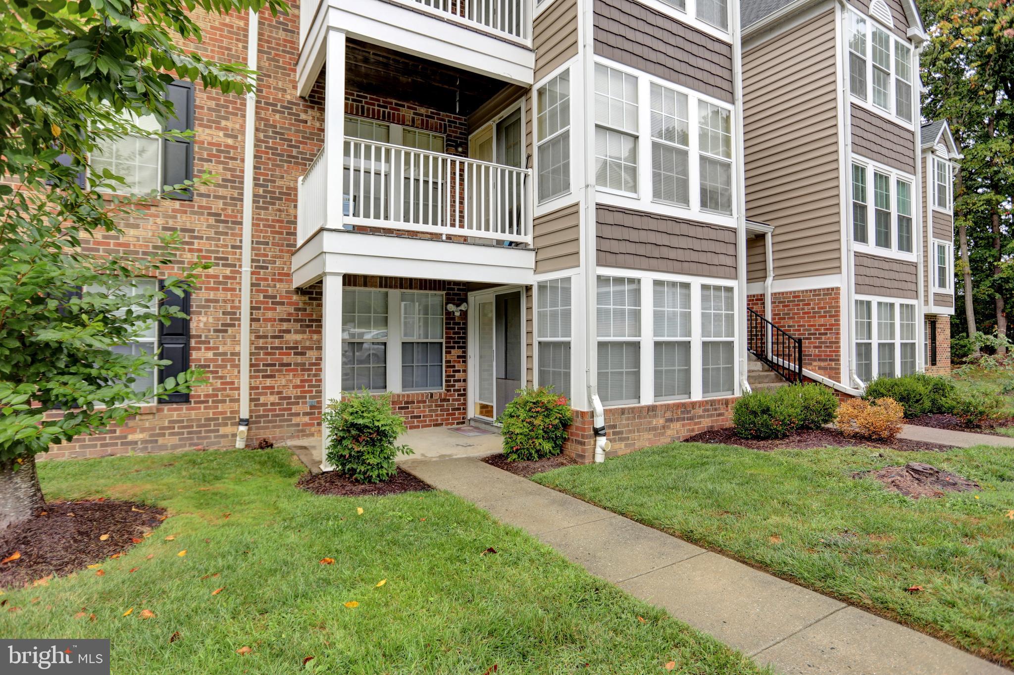 904 A Swallow Crest Court, Unit 904A Edgewood, MD 21040 - Photo 27 of 33 a front view of a house with a yard