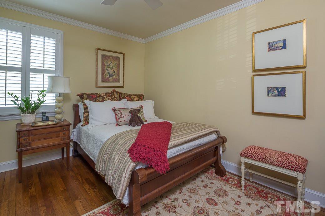 3104 Georgian Terrace Raleigh, NC 27607 - Photo 14 of 25 a bedroom with a bed and a couch