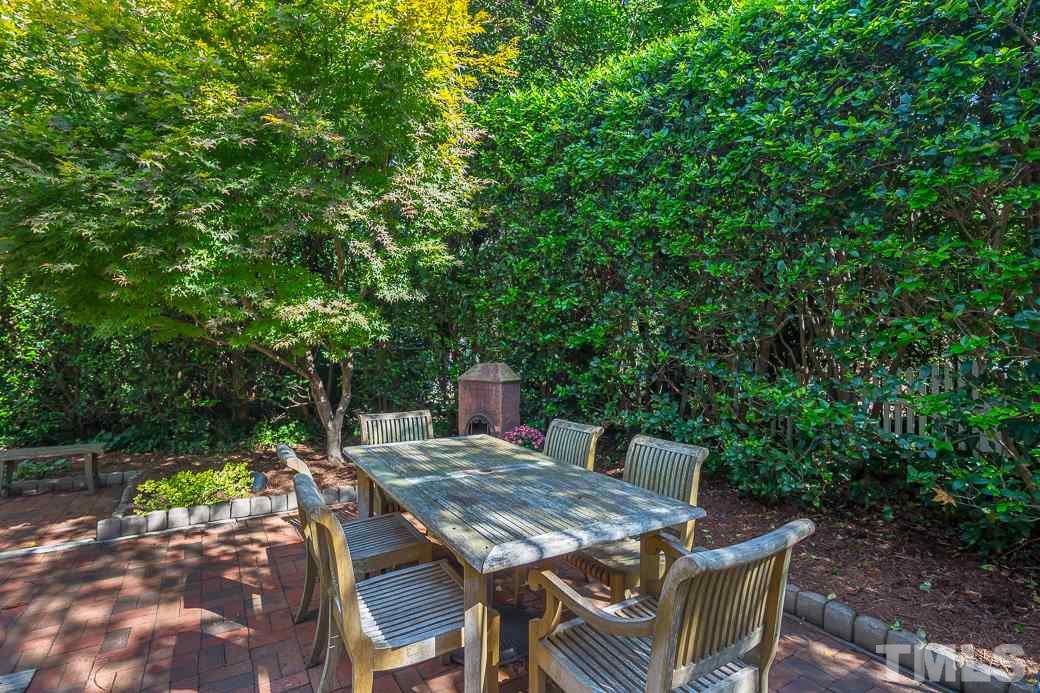 3104 Georgian Terrace Raleigh, NC 27607 - Photo 21 of 25 a view of a table and chairs in patio