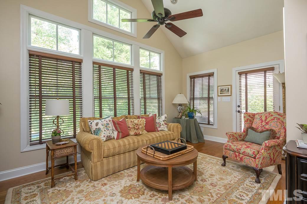 3104 Georgian Terrace Raleigh, NC 27607 - Photo 6 of 25 a living room with furniture and a large window