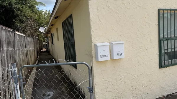 a view of a house with a street