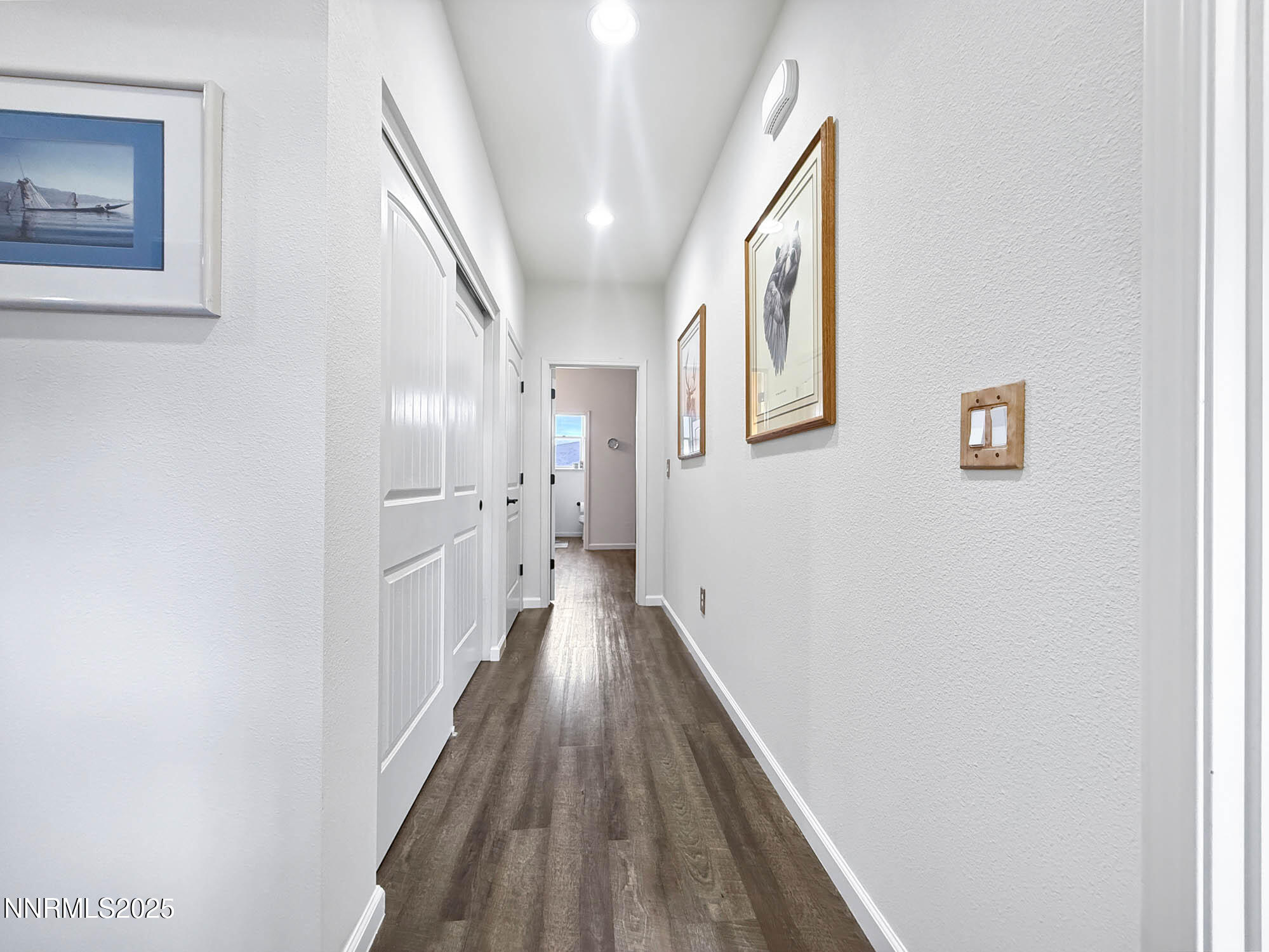 105 James Ranch Court Reno, NV 89510 - Photo 18 of 36 a view of a hallway with wooden floor