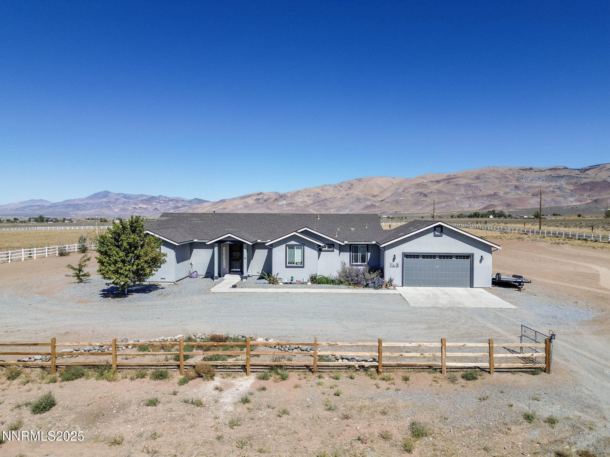 105 James Ranch Court Reno, NV 89510 - Photo 2 of 36 front view of a house with a big yard