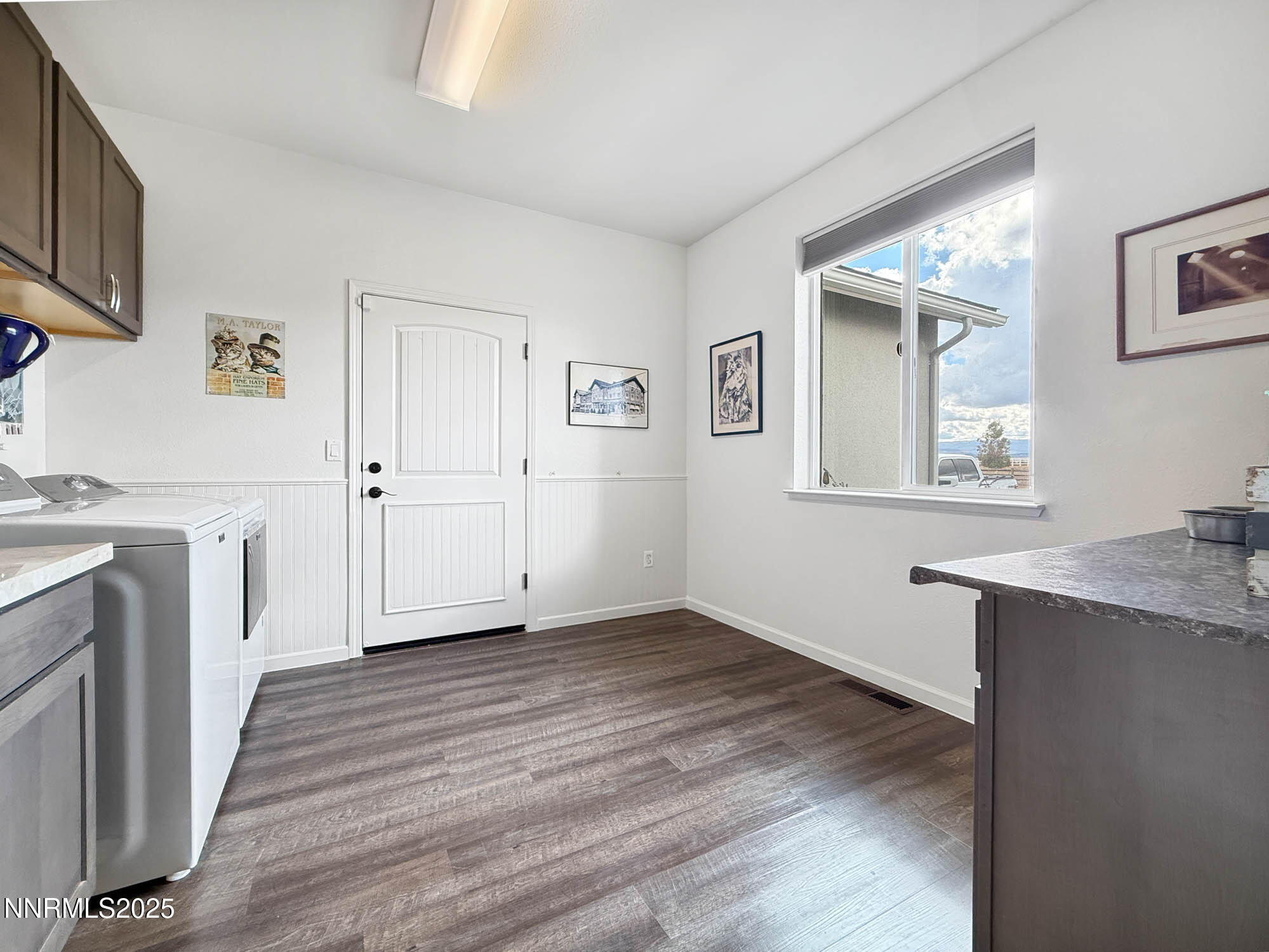 105 James Ranch Court Reno, NV 89510 - Photo 26 of 36 a view of a kitchen cabinets a sink and wooden floor