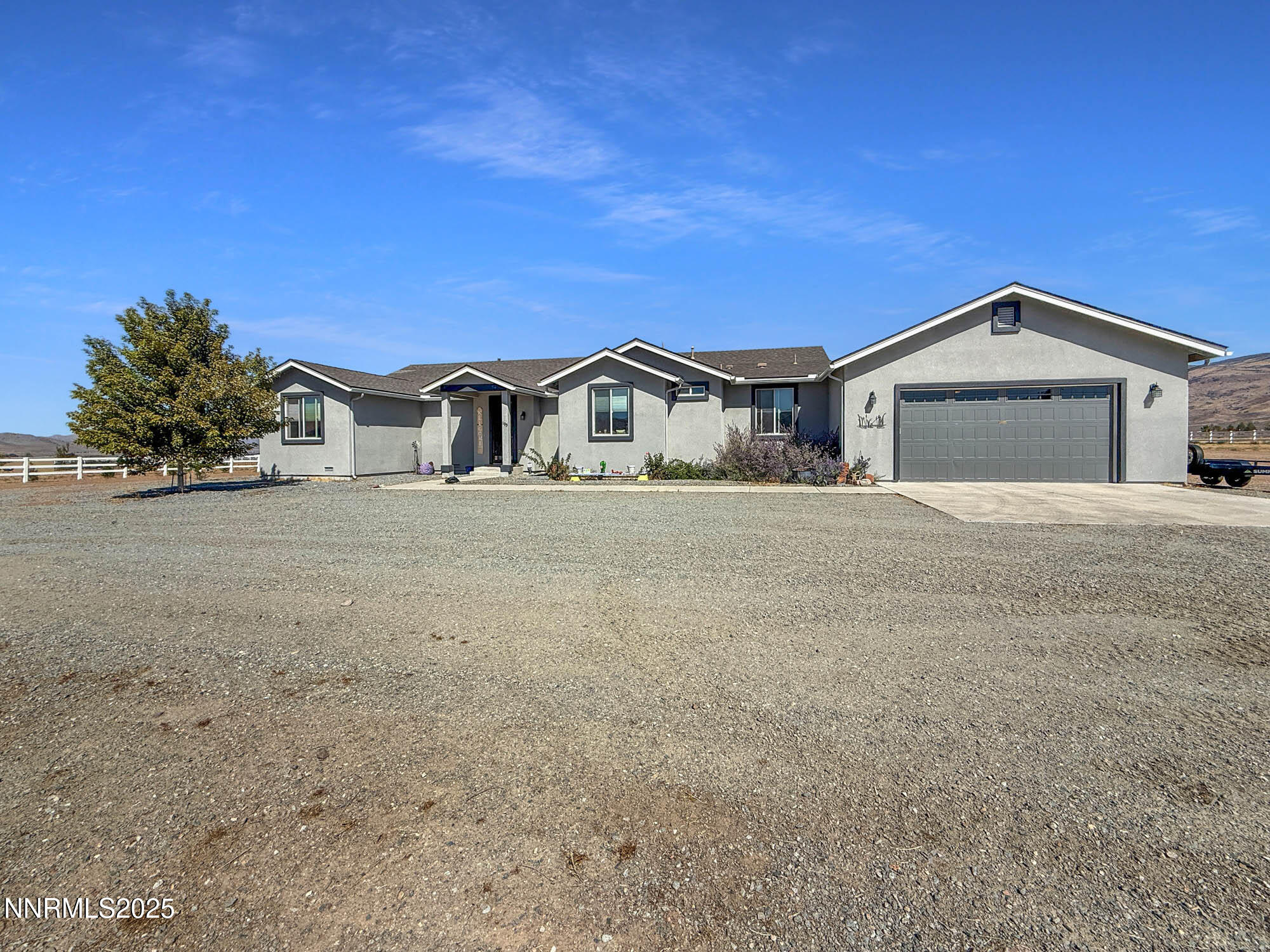 105 James Ranch Court Reno, NV 89510 - Photo 36 of 36 a front view of a house with a yard