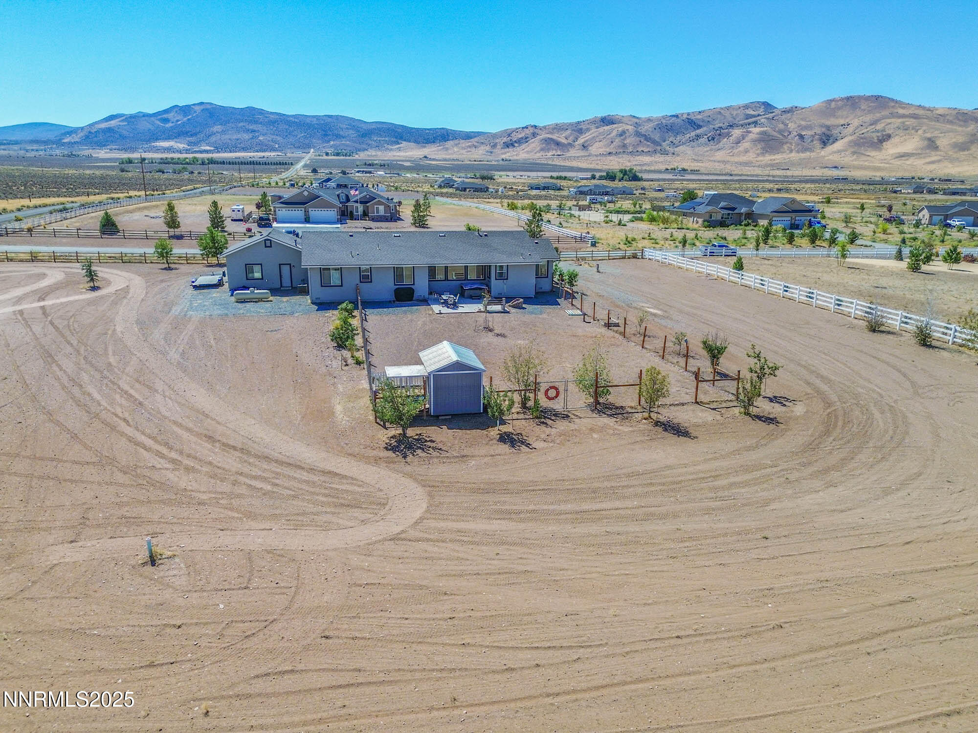 105 James Ranch Court Reno, NV 89510 - Photo 4 of 36 an aerial view of houses with a road