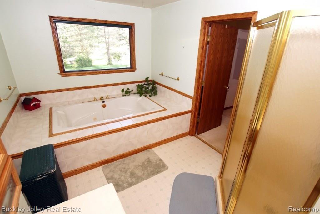 1748 Peavy Road Howell, MI 48843 - Photo 9 of 22 Jetted Tub and Separate Shower