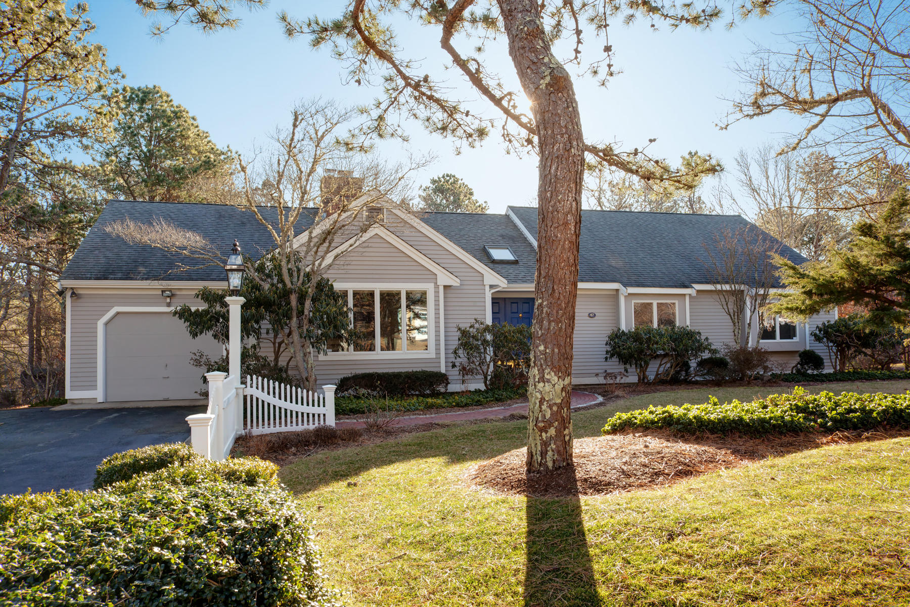 47 Meadowbrook Road Mashpee, MA 02649 - Photo 1 of 31 a front view of a house with swimming pool yard and patio