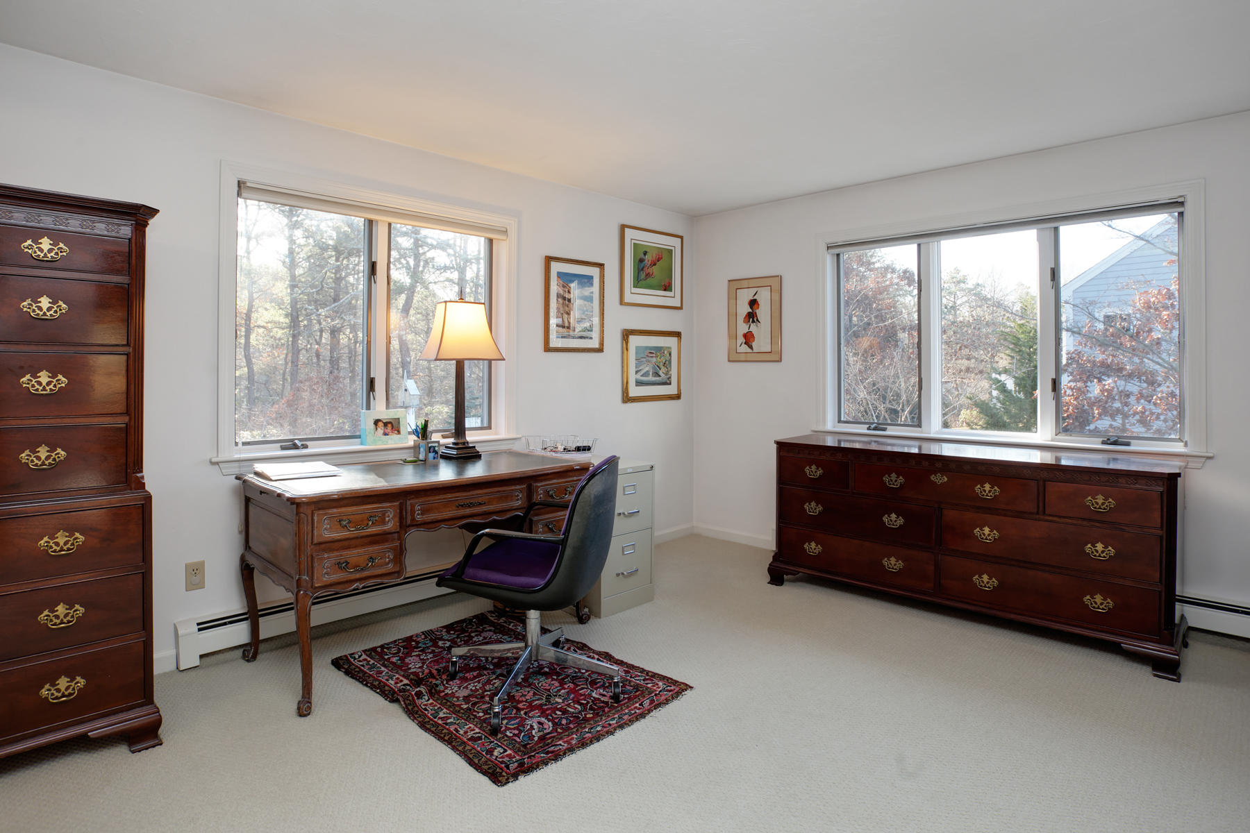 47 Meadowbrook Road Mashpee, MA 02649 - Photo 16 of 31 a room with a dresser and a window