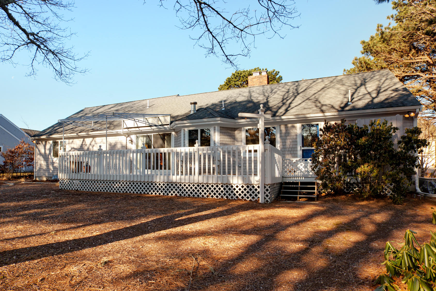 47 Meadowbrook Road Mashpee, MA 02649 - Photo 18 of 31 a front view of a house with a garden