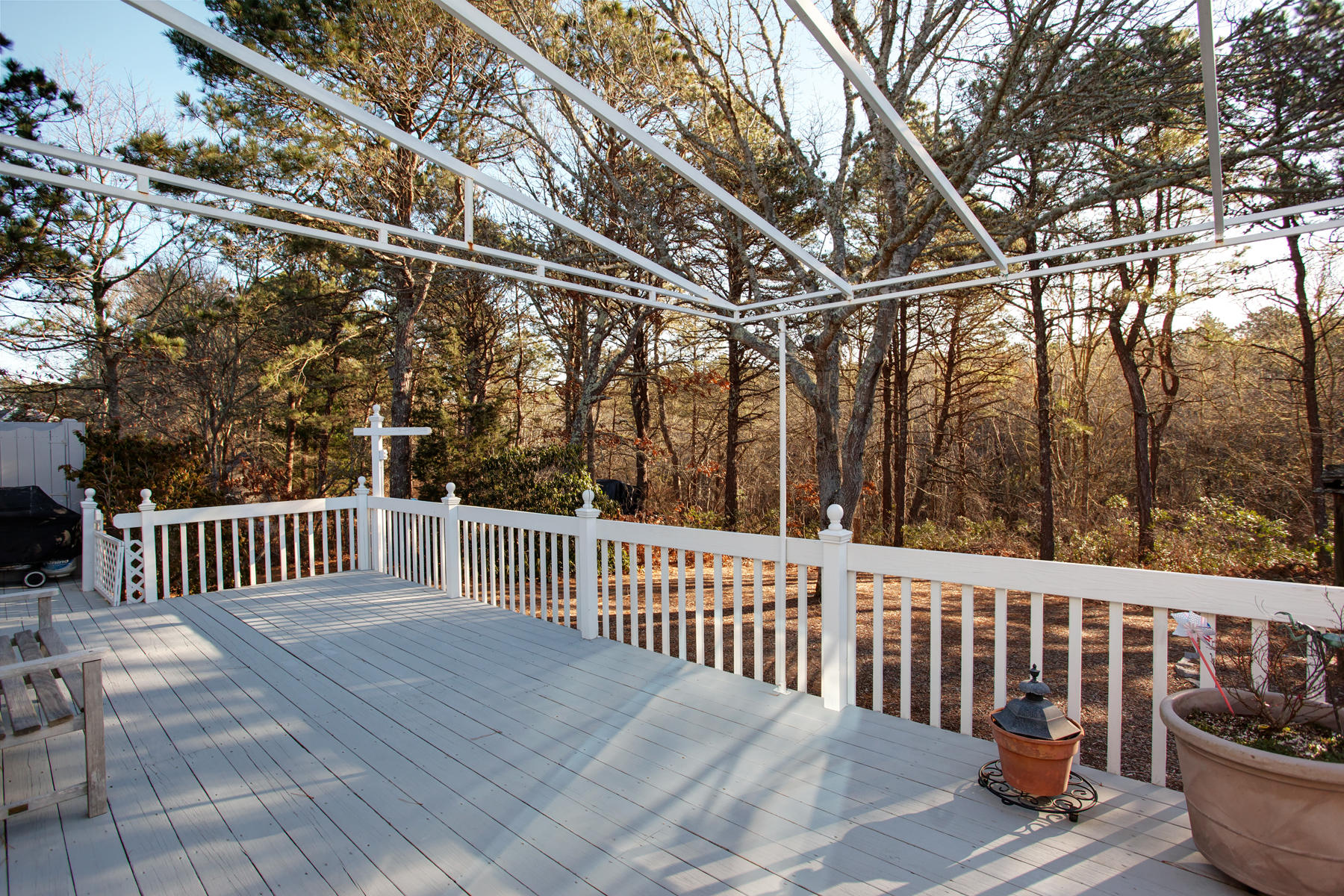 47 Meadowbrook Road Mashpee, MA 02649 - Photo 20 of 31 a view of a yard with wooden fence