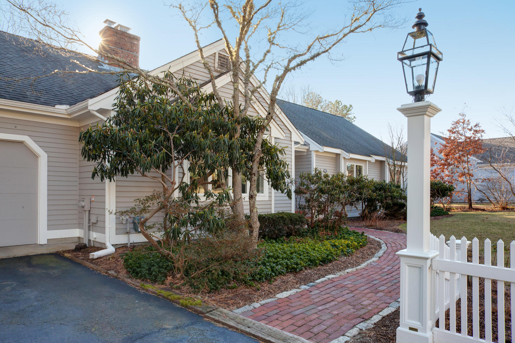 47 Meadowbrook Road Mashpee, MA 02649 - Photo 2 of 31 a front view of a house with garden