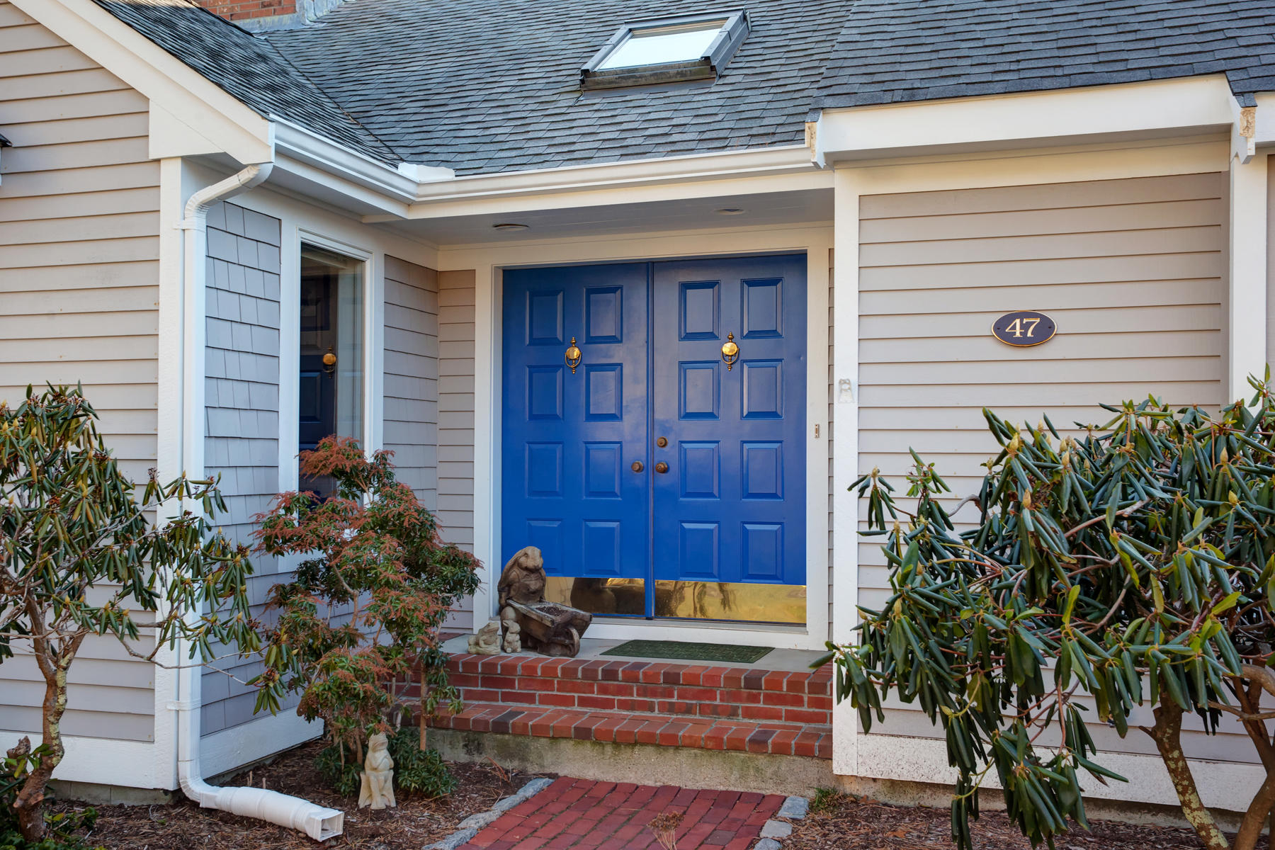 47 Meadowbrook Road Mashpee, MA 02649 - Photo 3 of 31 a view of a entryway door front of house
