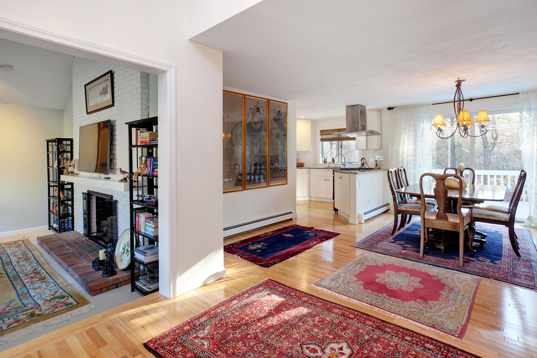 47 Meadowbrook Road Mashpee, MA 02649 - Photo 5 of 31 a living room with fireplace furniture and a rug