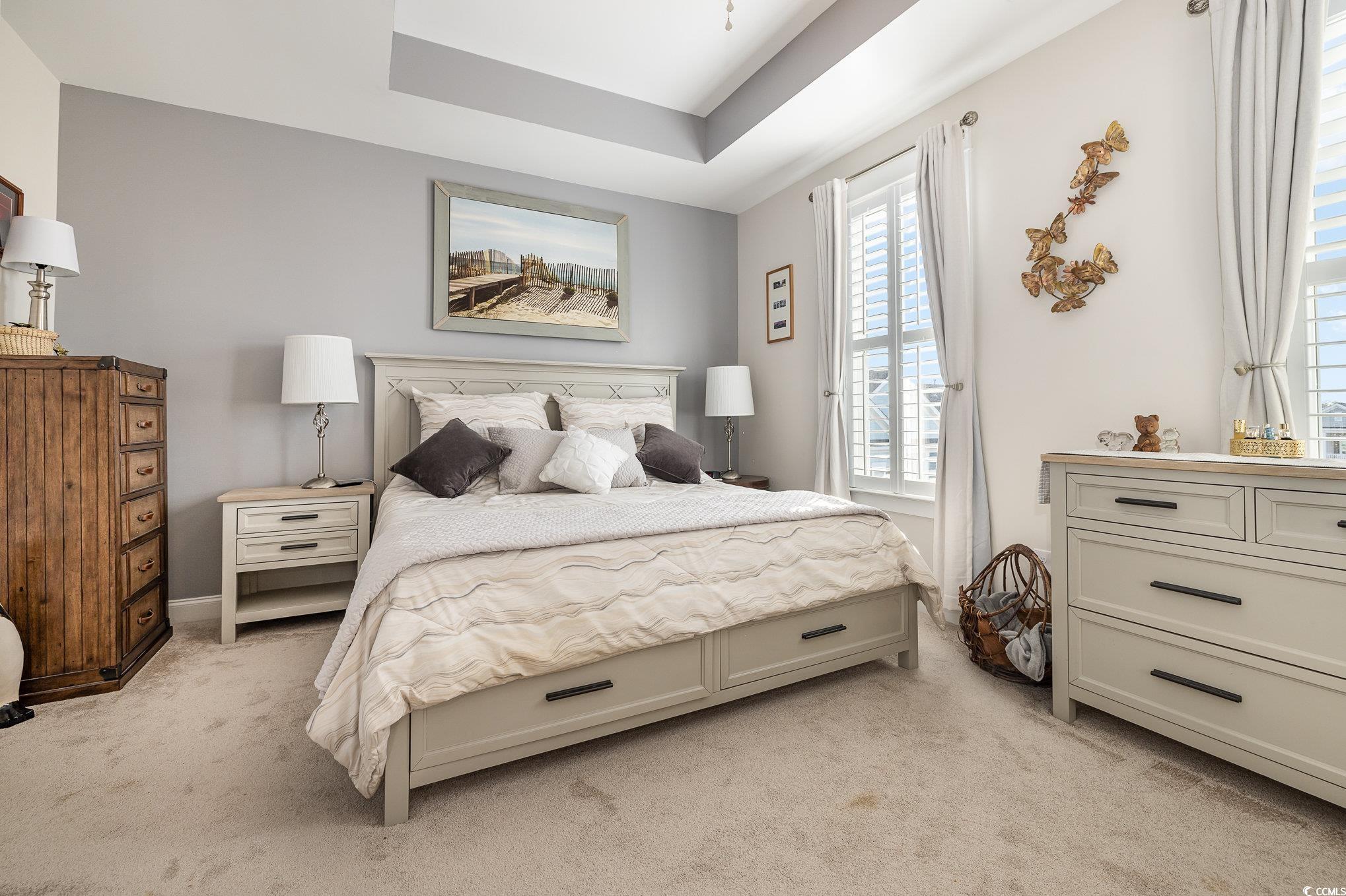 839 Rosa Circle Myrtle Beach, SC 29577 - Photo 26 of 40 Bedroom featuring light colored carpet and a raise