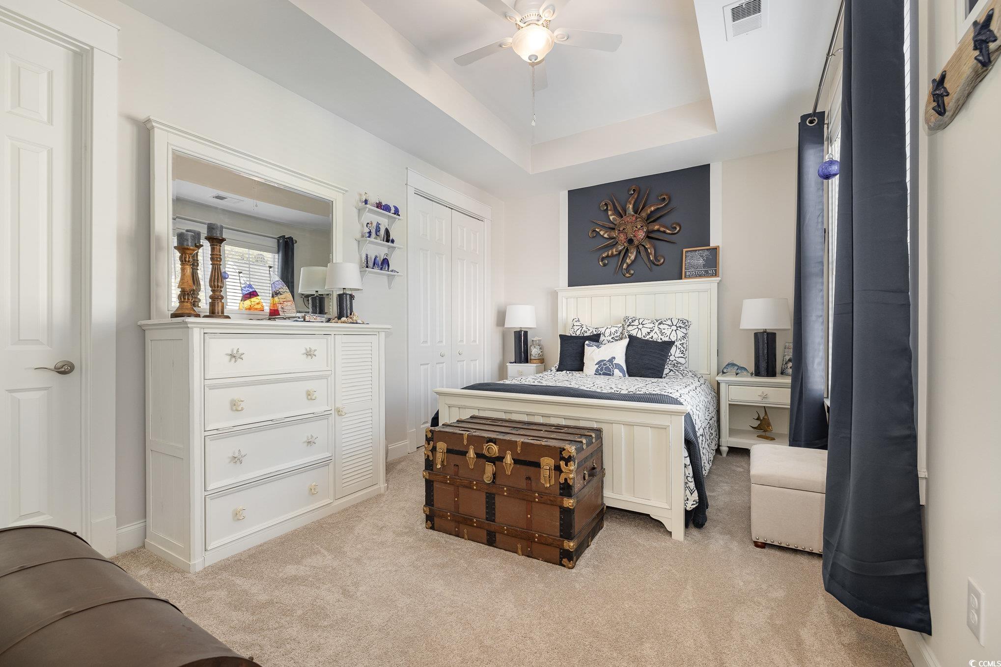 839 Rosa Circle Myrtle Beach, SC 29577 - Photo 30 of 40 Carpeted bedroom with a raised ceiling, ceiling fa