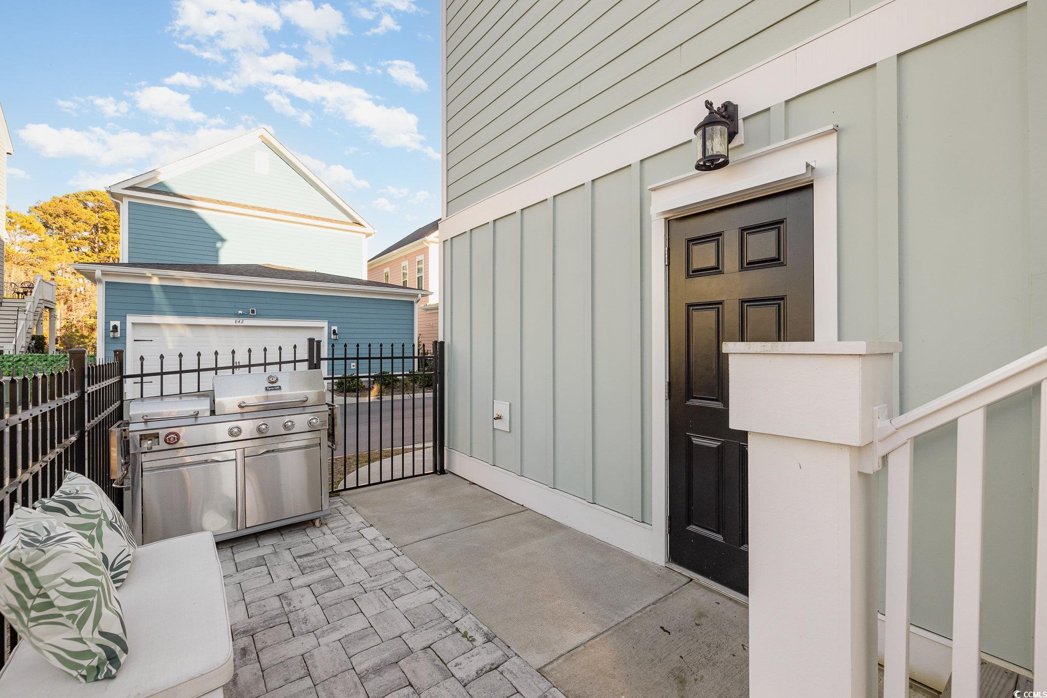 839 Rosa Circle Myrtle Beach, SC 29577 - Photo 35 of 40 View of patio featuring a grill