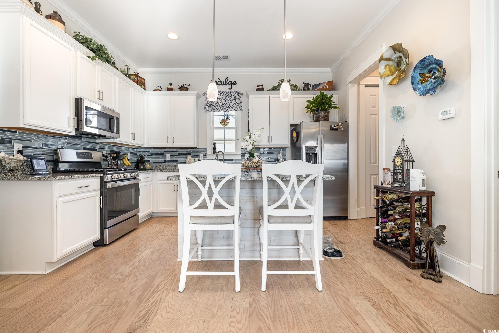 839 Rosa Circle Myrtle Beach, SC 29577 - Photo 10 of 40 Kitchen with appliances with stainless steel finis
