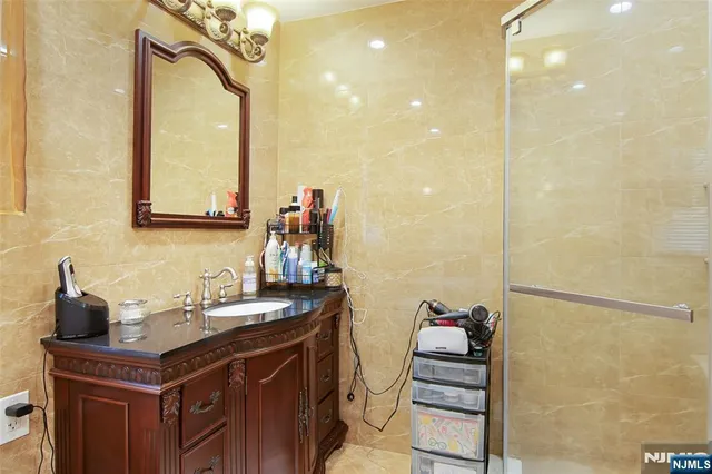 a bathroom with a sink and a mirror