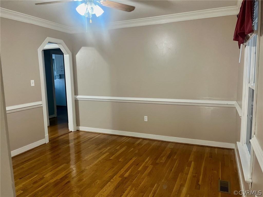 11001 Crofton Road Chester, VA 23831 - Photo 17 of 31 wooden floor in an empty room with a window