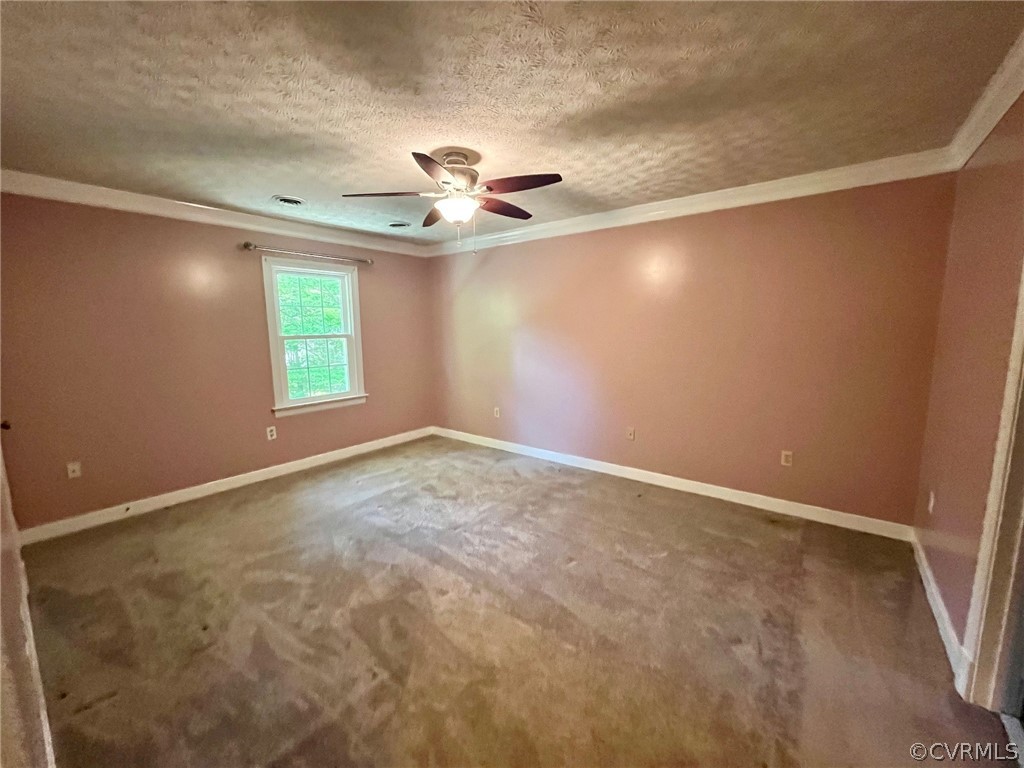 11001 Crofton Road Chester, VA 23831 - Photo 26 of 31 an empty room with windows and fan