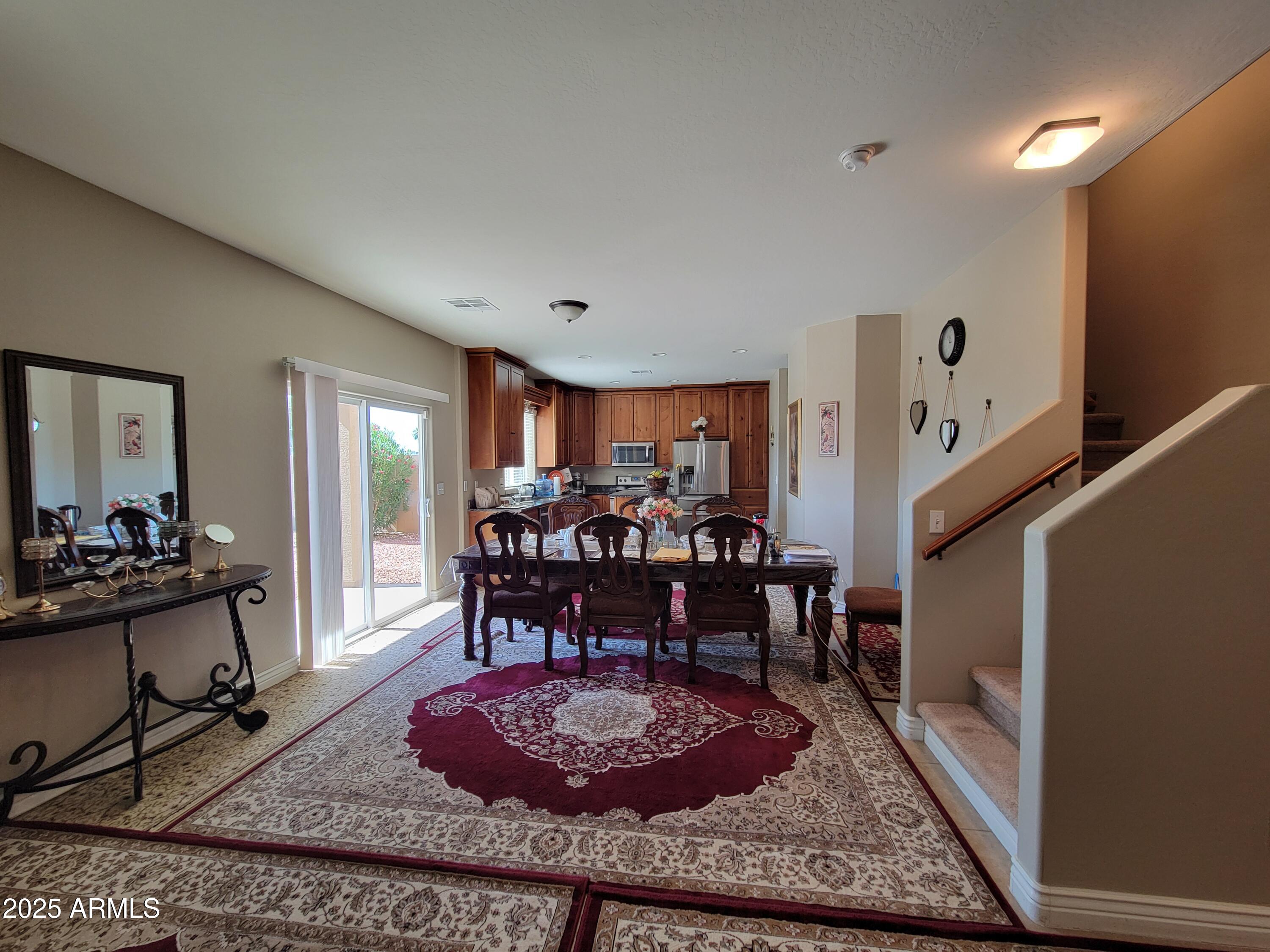7439 West Wolf Street Phoenix, AZ 85033 - Photo 9 of 21 a view of a dining room with furniture