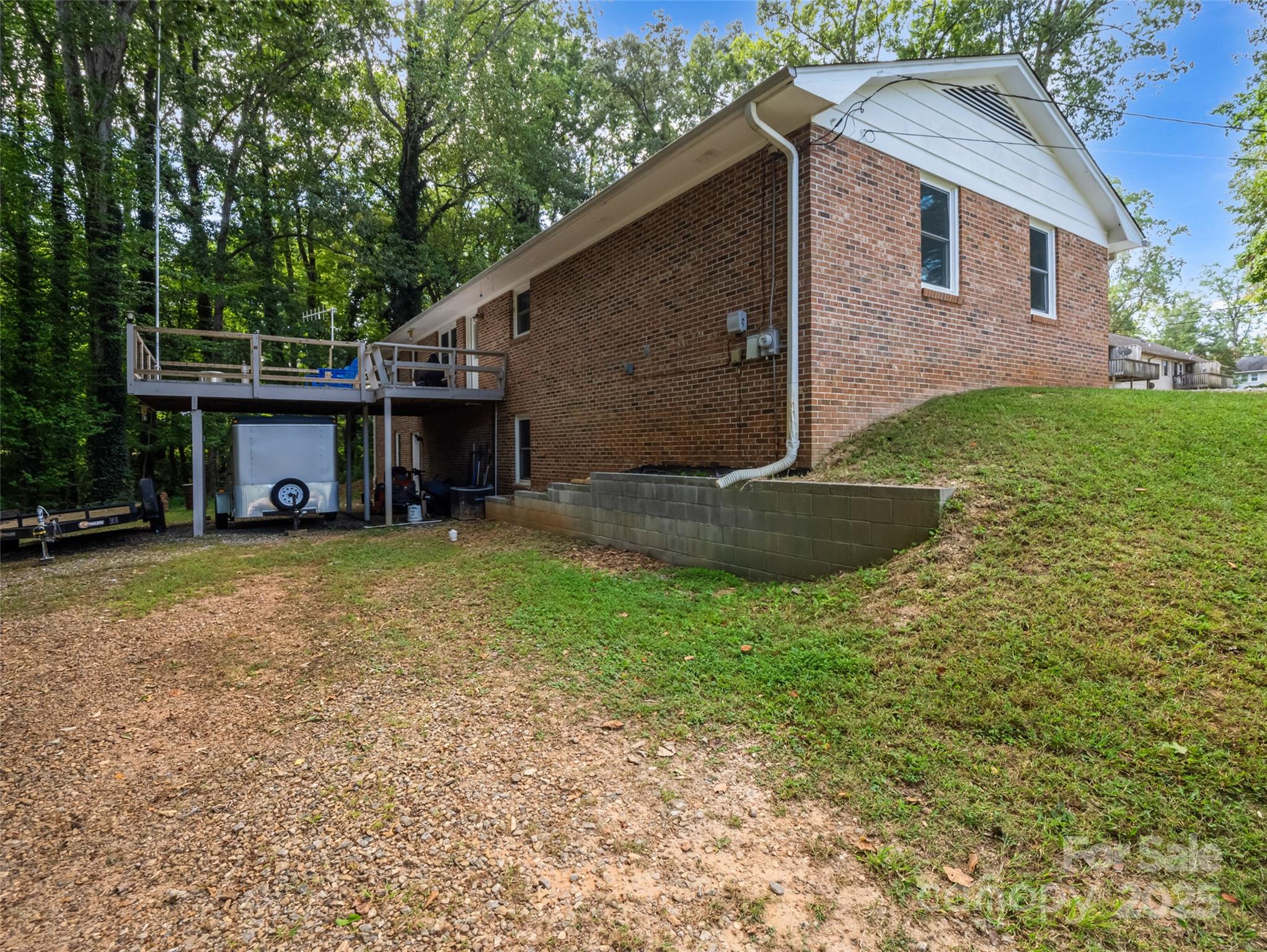 263 Blanton Street Columbus, NC 28722 - Photo 42 of 45 a front view of a house with garden