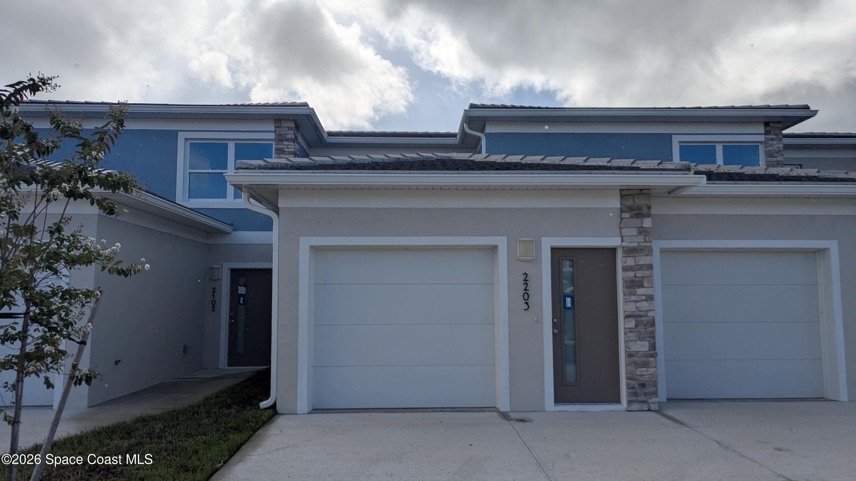 1635 Par Street Northeast, Unit 2103 Palm Bay, FL 32905 - Photo 2 of 36 front view of a house