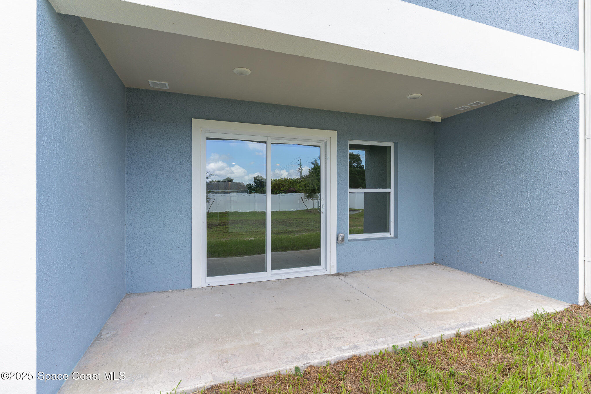 1635 Par Street Northeast, Unit 2103 Palm Bay, FL 32905 - Photo 31 of 36 a view of an empty room with a window