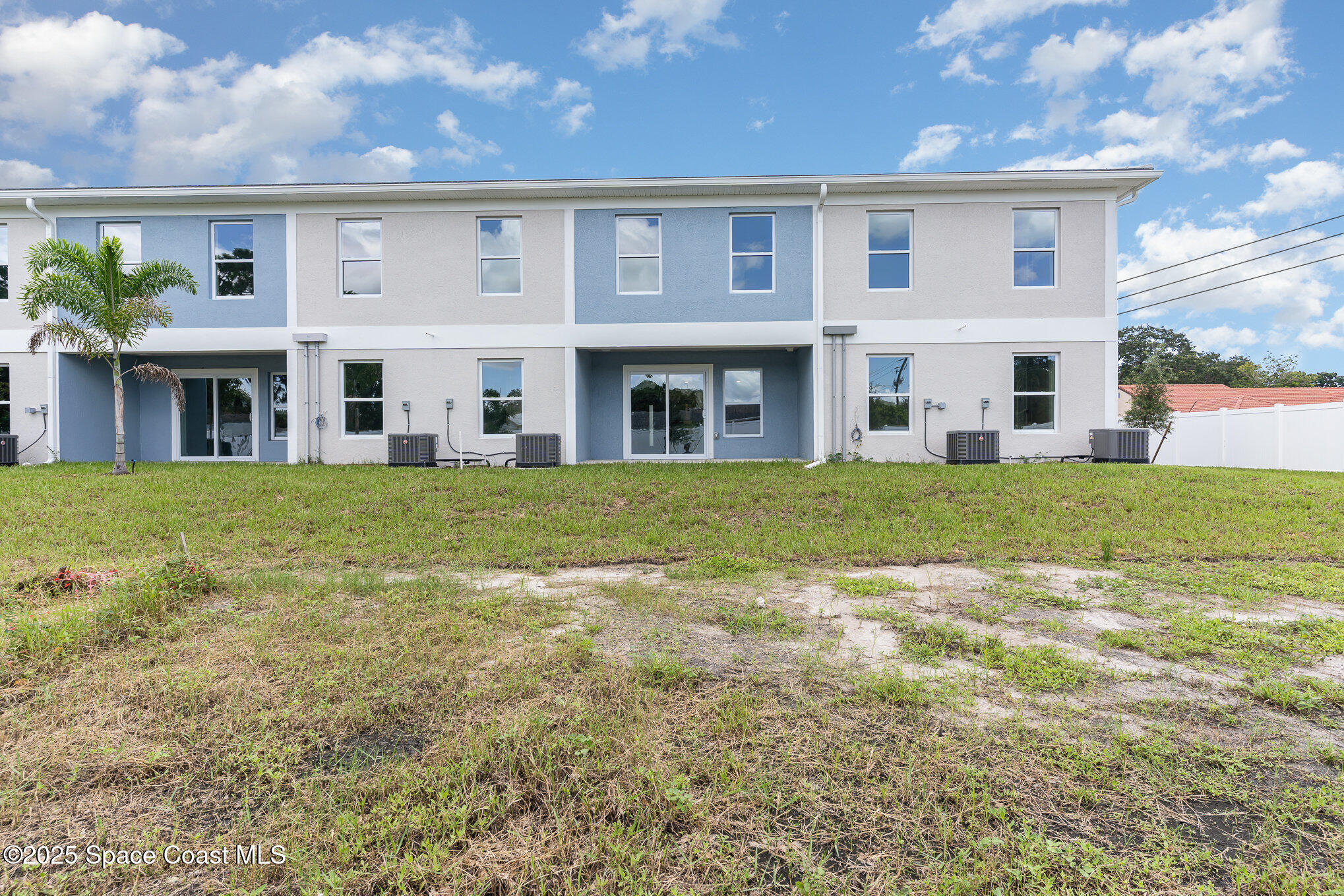 1635 Par Street Northeast, Unit 2103 Palm Bay, FL 32905 - Photo 34 of 36 a view of a yard in front of a building