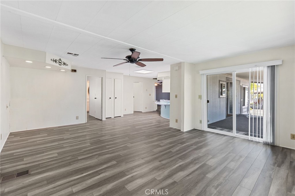 27701 Murrieta Road, Unit 227 Menifee, CA 92586 - Photo 13 of 36 a view of empty room with wooden floor